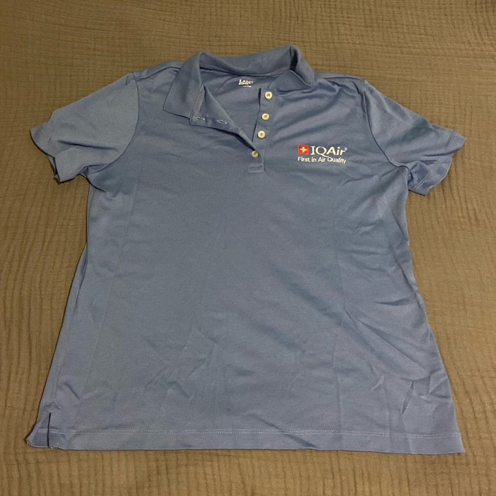 Lands end uniform short sleeve blue polo shirt with IQAir Logo.